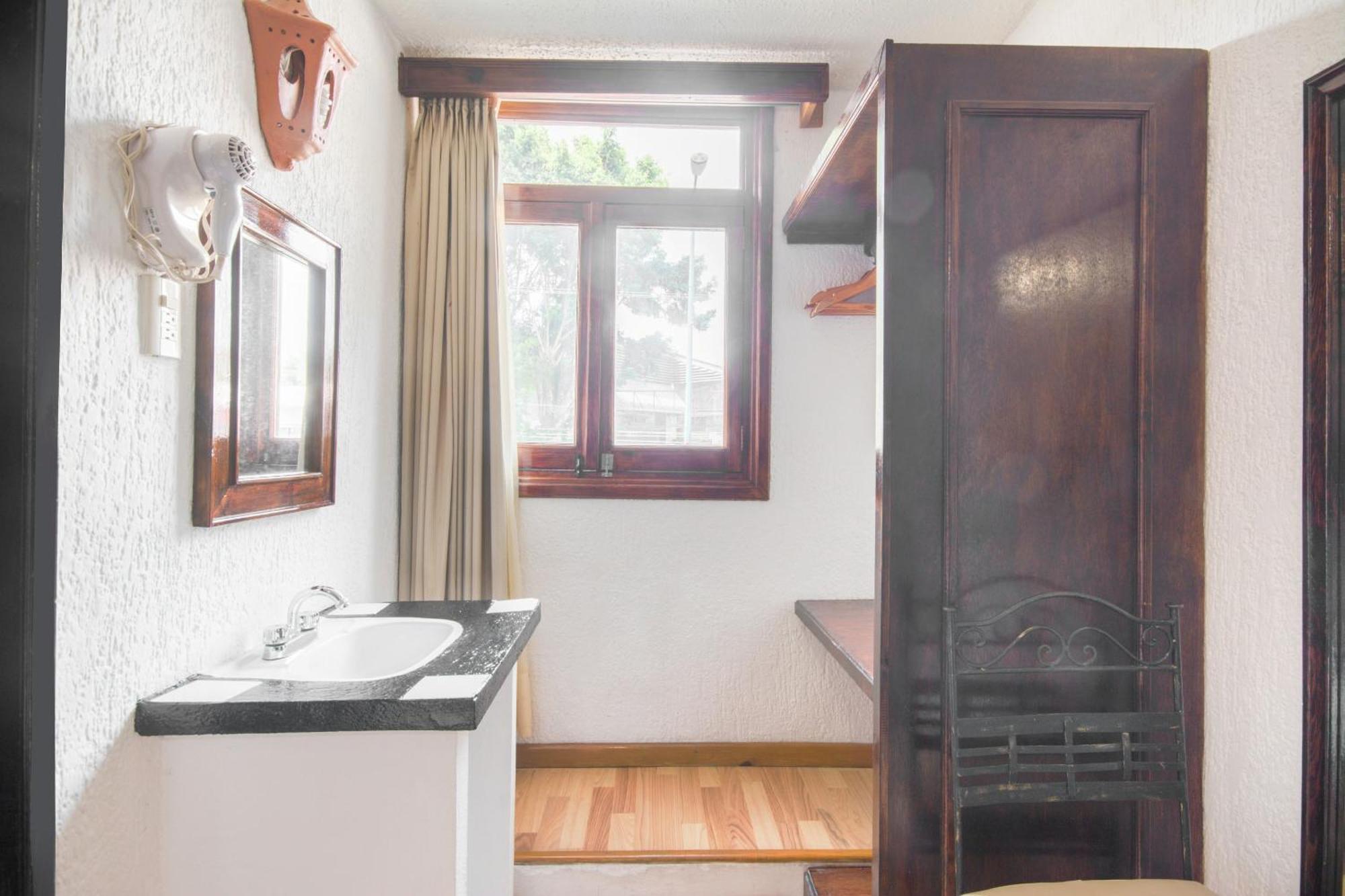 Capital O Hotel Central, Xalapa Ngoại thất bức ảnh